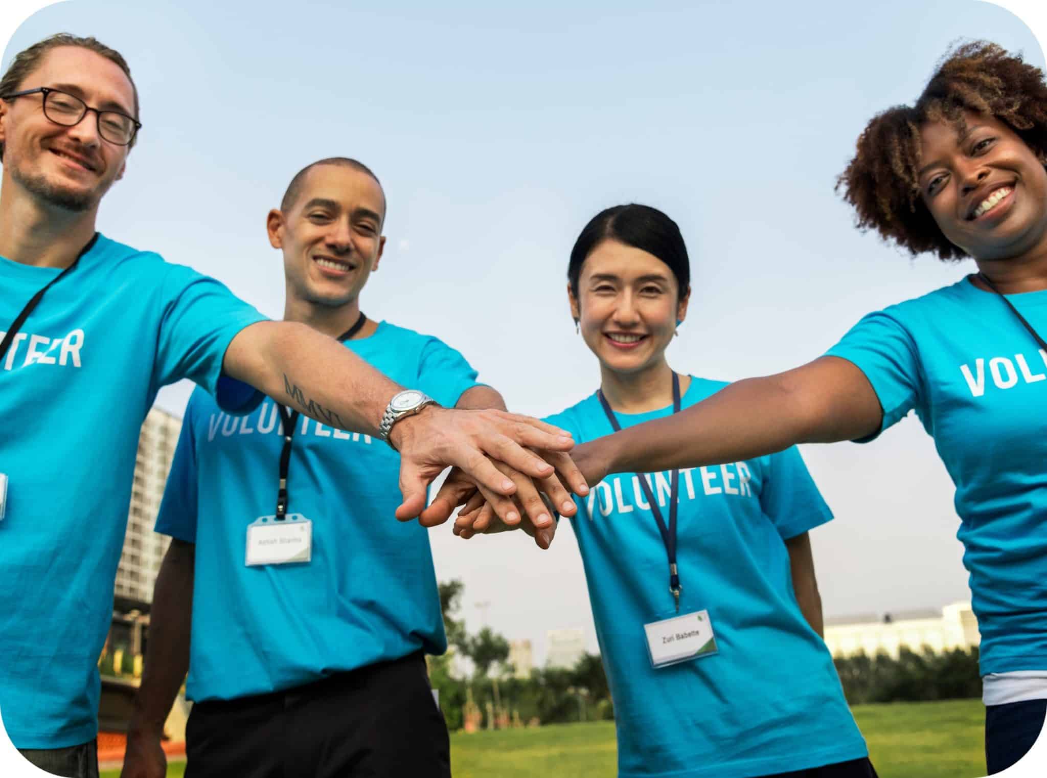 Team Volunteers Stacking Hands 1 Min