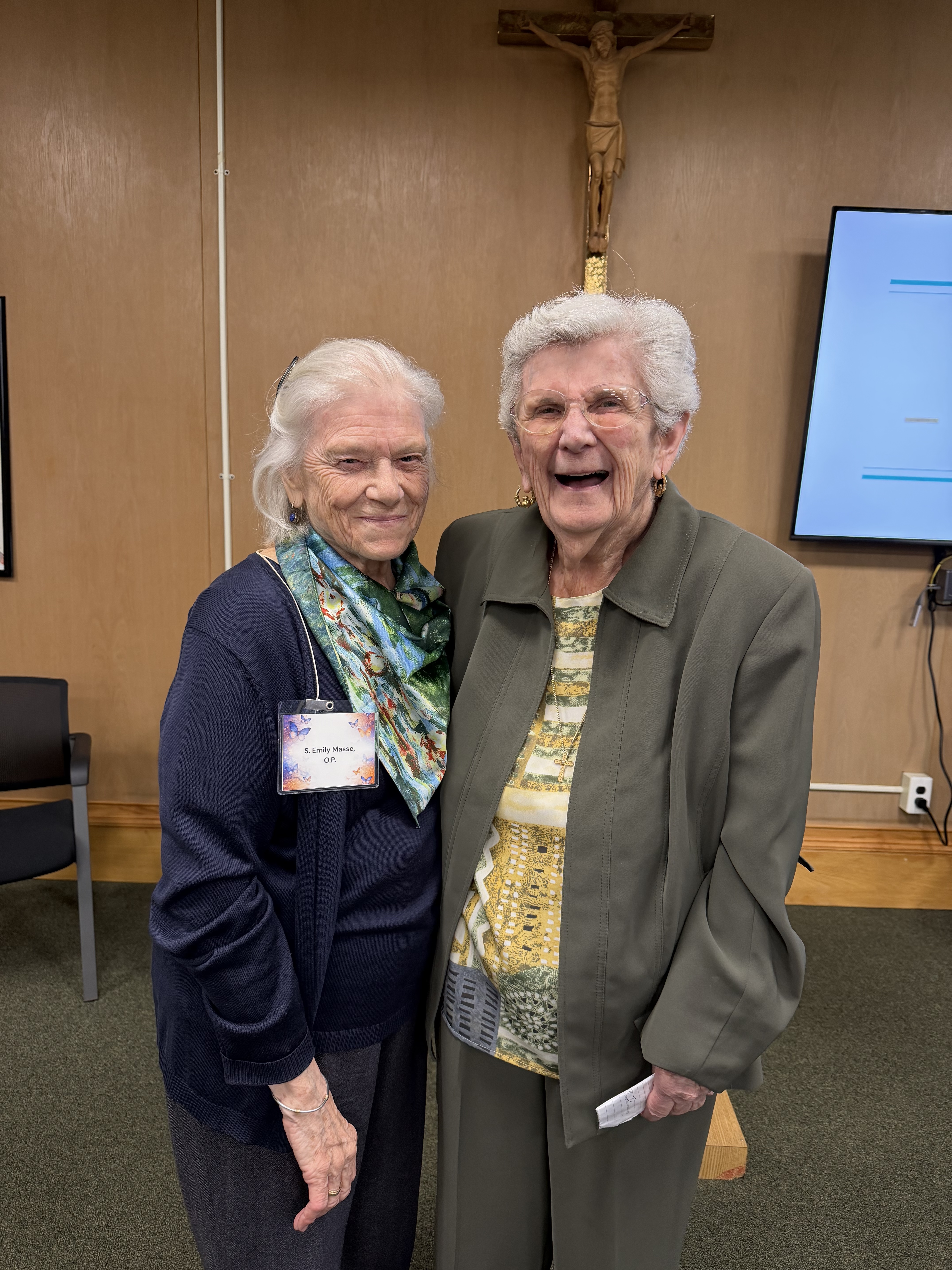 Sisters reuniting at the fundraising event.